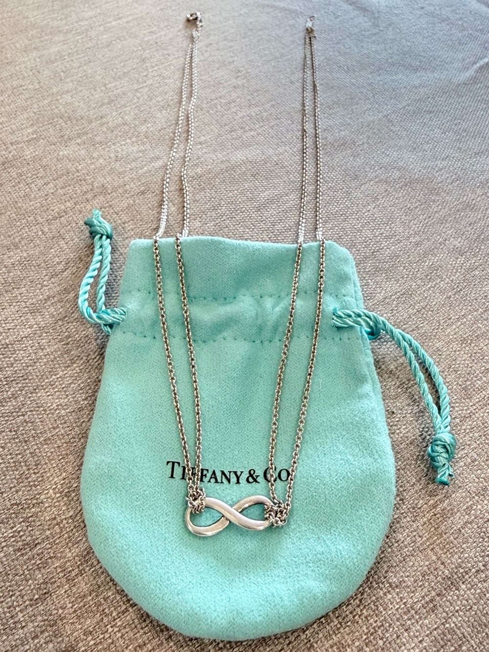 Tiffany & Co. Sterling Silver Infinity Necklace with Tiffany Blue Pouch